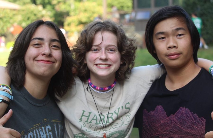 From left, sophomores Ava, Gabby, and Asher get together in front of the lively Sippin’ Shoppe. They were all smiles for the sunniest day at Windy Gap. 
