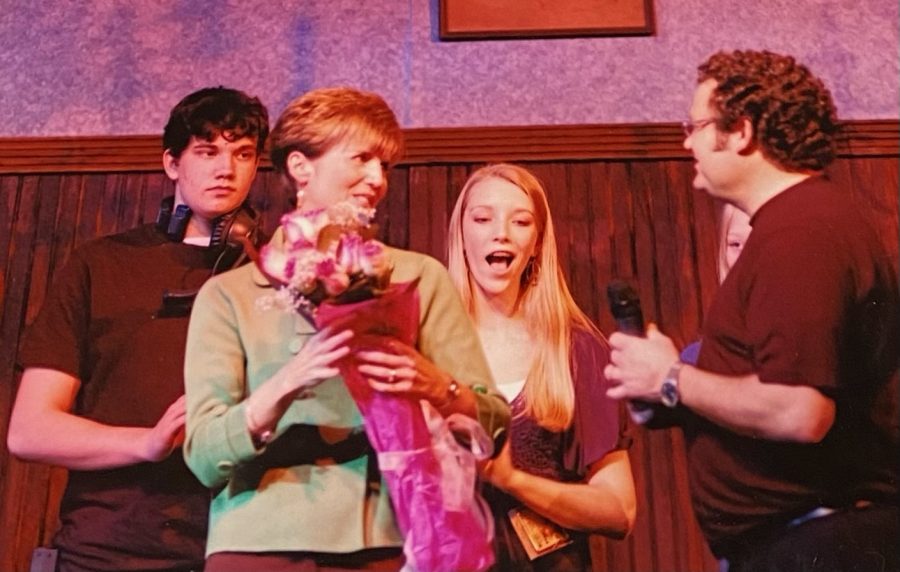 Mrs. Brinkley is receiving flowers for her directing of the play The Mousetrap. She had loved the play after having seen it once in London, and was very grateful for the opportunity to embrace it herself. 