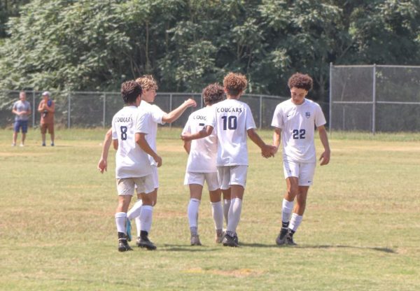 The men’s varsity soccer team celebrates a goal against Independence High School in the Independence 
High School soccer jamboree in August. The team would go on to win 2-0. From left to right: (Kevin Perez, Hudson Connel, Shane Durso, Chris Cerqueira, and Ethan Berry). Photo via  trent_prodz/
